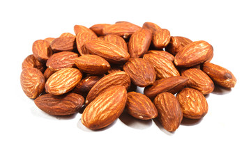 Pile of sweet almond nut  isolated on white background.