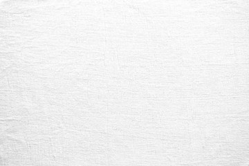 White grunge canvas background. White linen fabric texture. Abstract woven surface.