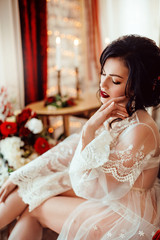 Fototapeta premium Beautiful bride in white dress on her wedding day