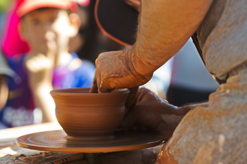 Fototapeta na wymiar pottery wheel workshop for children