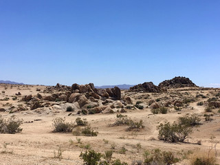 In the mountains of California in the summer. Stones, sand, sun