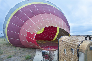 Cappadocia, Goreme, Turkey. The process of inflating hot air balloons