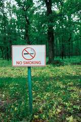 Label not smoking in the forest