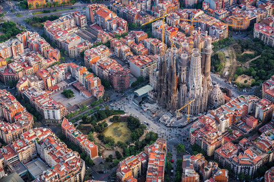 Barcelona aerial view, Eixample residencial district and Sagrada Familia Basilica, Spain