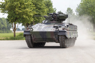 German infantry fighting vehicle drives on a road