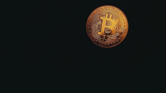 Bitcoin coin asphalt background 