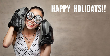 Crazy young woman and the message "Happy Holidays!!"