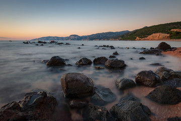 Fototapeta na wymiar Sardinia sunrise in Cala Gonone, Italy