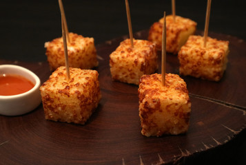 Brazilian snack dadinho de tapioca. Finger food appetizer made of tapioca and coalho cheese.