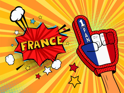 Male hand in the country flag glove of a sports fan raised up celebrating win and France speech bubble with stars and clouds. Vector colorful illustration in retro comic style