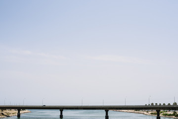 Fototapeta premium Great road bridge over river without day cars.