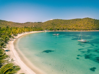 Aerial view of Mayreau beach in St-Vincent and the Grenadines - Tobago Cays. The paradise beach...