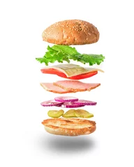 Deurstickers Fresh sandwich with flying ingredients isolated on white background © mahara
