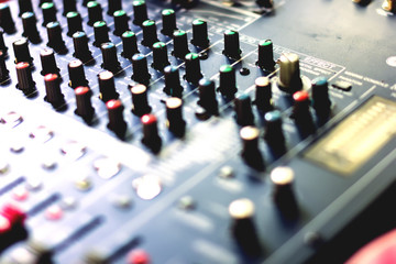 Button to adjust the volume control of the audio mixer.