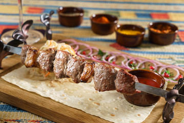 grilled kebab with sauce
