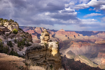 Duck On A Rock Viewpoint  at Grand Canyon at late afternoon with clouds background