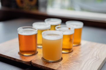 Sampling variety of beers from a beer flight