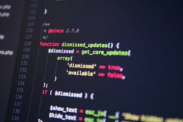 Simple website HTML code with colorful tags in browser view on dark background. Software developer programming code. Screen of code for overlay background.