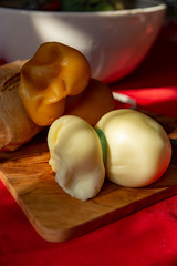Smoked and white Fresh South Italian traditional cow or cow and sheep semi-soft cheese Scamorza...