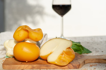 Smoked and white Fresh South Italian traditional cow or cow and sheep semi-soft cheese Scamorza...