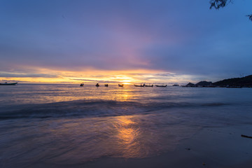 Fototapeta premium seascape and sunset twilight times at beach smooth reflections by wide angle lens