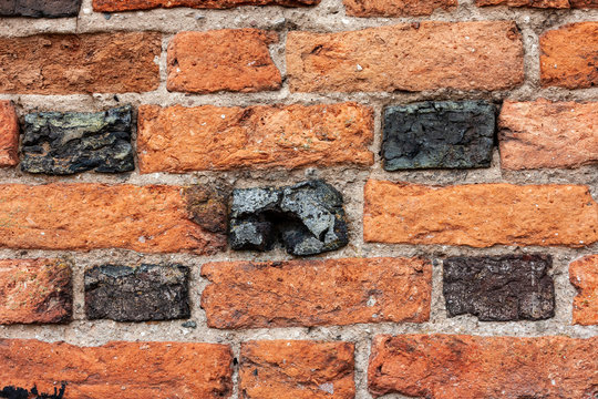 old brick wall of cracked bricks © Vladis