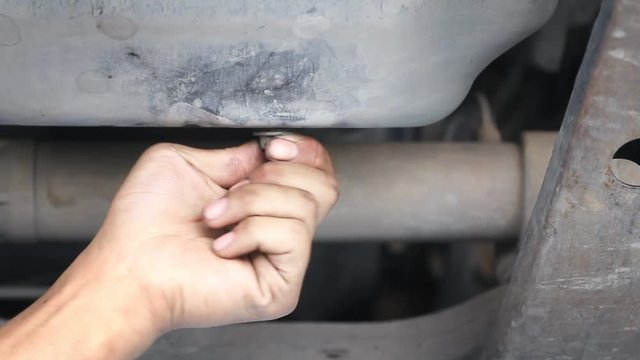 drain old car engine oil