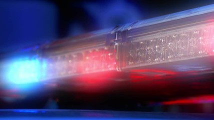Flashing emergency siren lights on police car