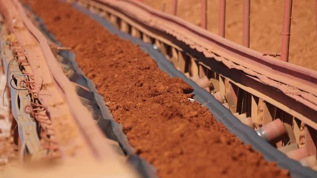 Conveyor belt transporting ore to the manufacturing plant