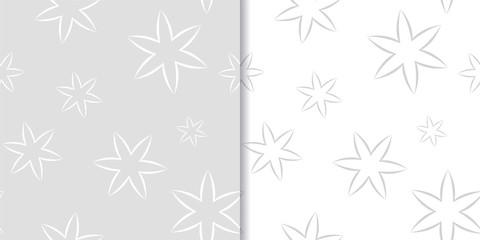 Light gray floral backgrounds. Set of seamless patterns