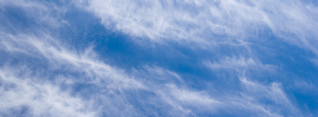 banner white clouds against a blue sky
