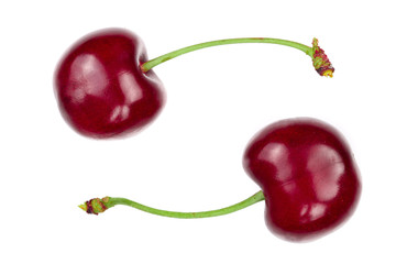 Sweet red cherries isolated on white background. Top view. Flat lay pattern