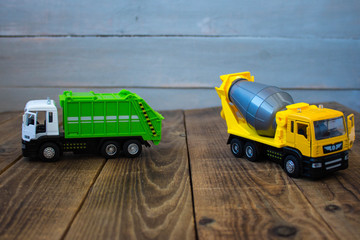 garbage truck and concrete mixer