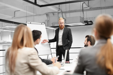 Office employees having meeting in conference room