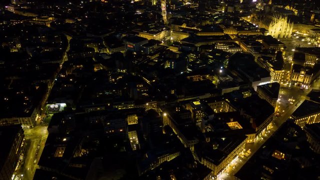 night illuminated malan city center aerial panorama 4k timelapse italy
