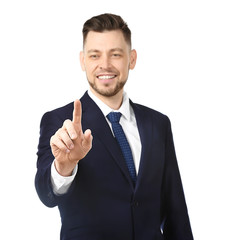Young businessman using virtual screen on white background