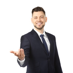 Young businessman holding something on white background