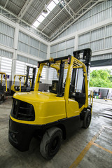 Forklift in warehouse