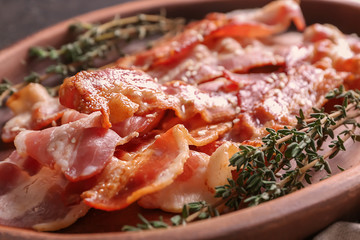 Dish with tasty bacon, closeup