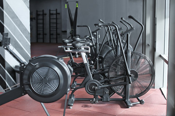 Modern equipment in new gym indoors