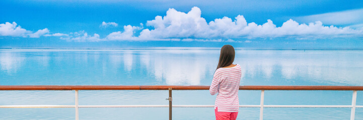 Cruise ship travel tourist woman on boat deck looking a peaceful summer night sky after rain....