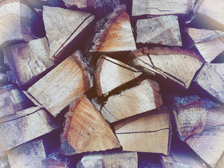 Firewood background, wall firewood, background of dry chopped firewood logs in a pile