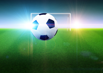 Naklejka premium Soccer ball and goal on field