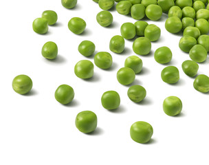 Scattered green peas over white background. Isolated with clipping path