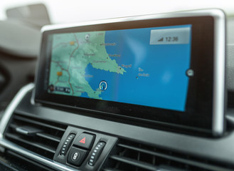 Close-up of gps navigation system device in travelling car