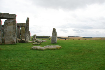 the Stonehenge complex among the vast green fields of England