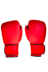 isolated pair of red boxing gloves