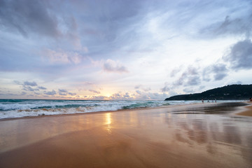 Stormy weather. Beautiful seascape with cloudy sky. Sunset on the beach.