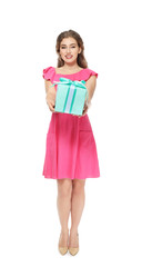 Beautiful young woman with gift box on white background