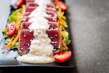 fresh tuna raw with vegetable salad and sauce